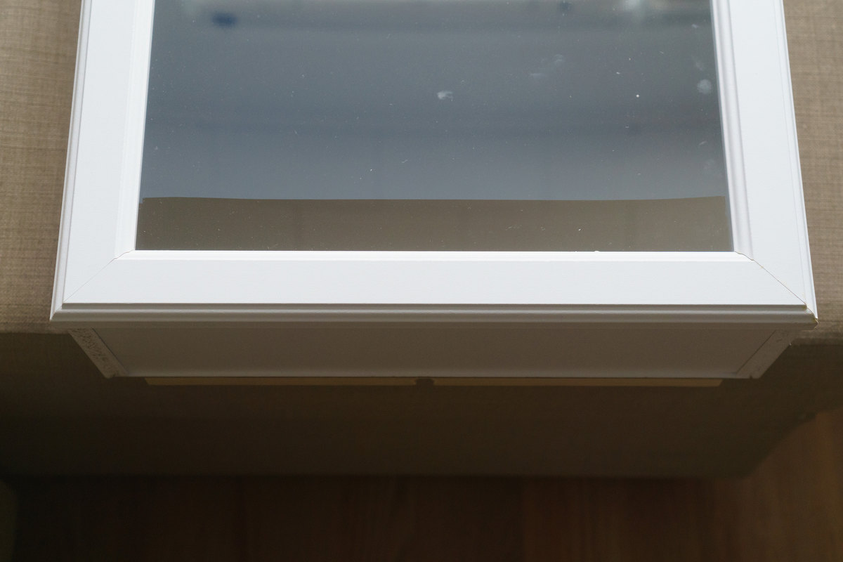 Masking off the bottom of the mirror